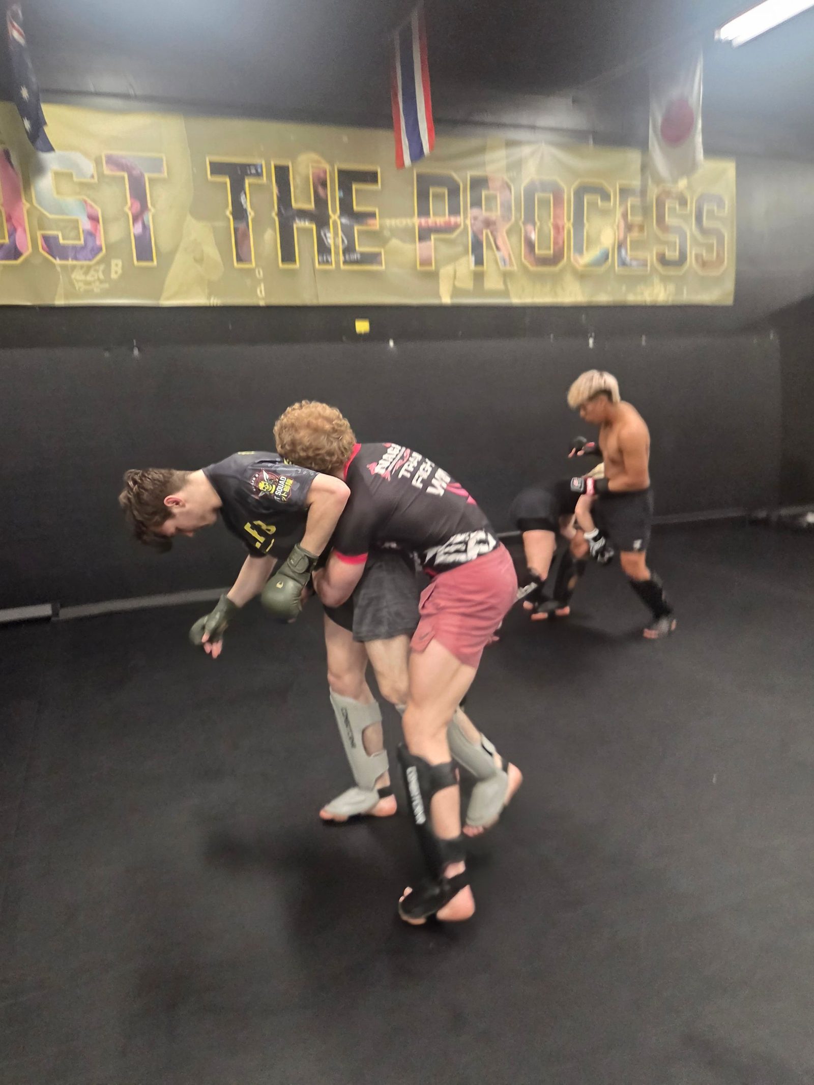 Killer B Combat Academy students participating in a structured martial arts practice.